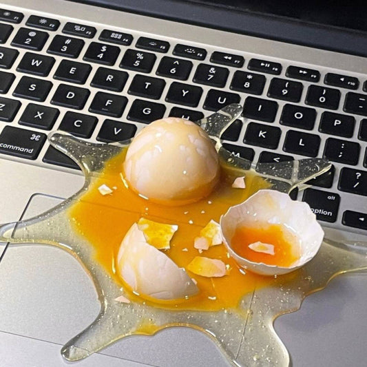 Funny "Spilled Broken Egg" Realistic Prank Phone Stand