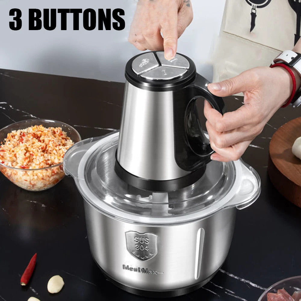 Stainless steel food chopper with a person using it, on a kitchen counter.